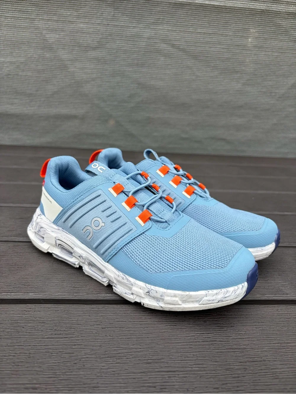 On Running CloudSwift Kids Light Blue with Orange Accents